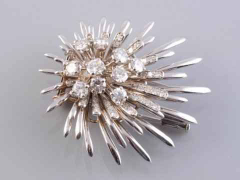 A CONTEMPORARY DIAMOND SPRAY BROOCH, the ten slightly graduating brilliant...