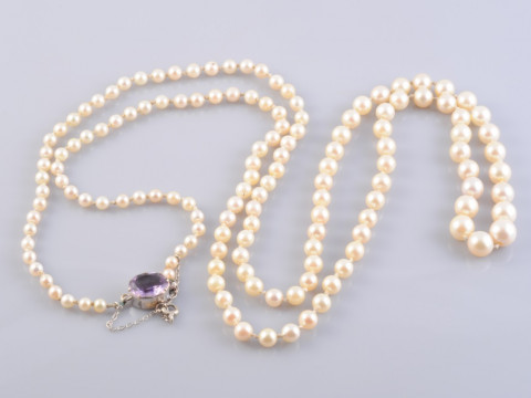 A CULTURED PEARL AND AMETHYST NECKLACE, the one hundred and forty-four...