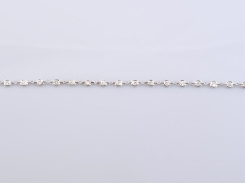 A DIAMOND BRACELET, the twenty-one brilliant cut diamonds each separately...