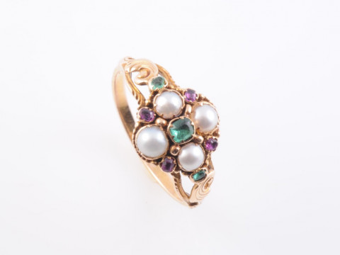 A GEORGIAN EMERALD, SPINEL AND PEARL RING, the square cut emerald highlight...