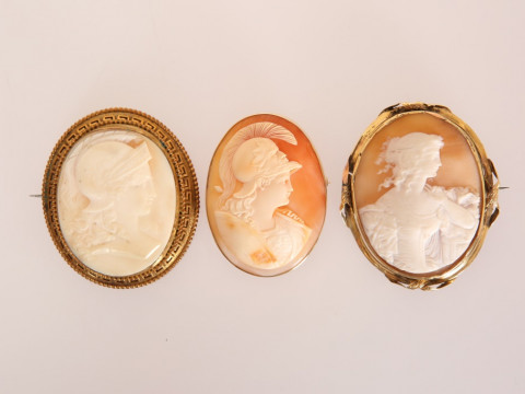 A GROUP OF THREE SHELL CAMEO BROOCHES: the first late 19th Century, with...