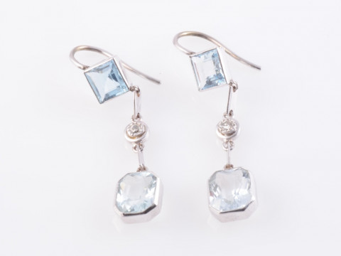 A PAIR OF AQUAMARINE AND DIAMOND EARRINGS, the cut-cornered square cut...