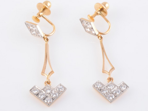 A PAIR OF DIAMOND EARRINGS, the six brilliant cut diamonds in a triangular...