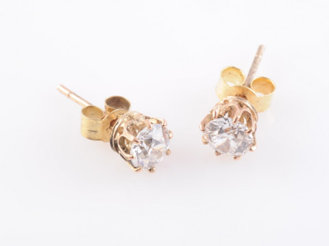 A PAIR OF DIAMOND STUD EARRINGS, the single brilliant cut diamond eight...