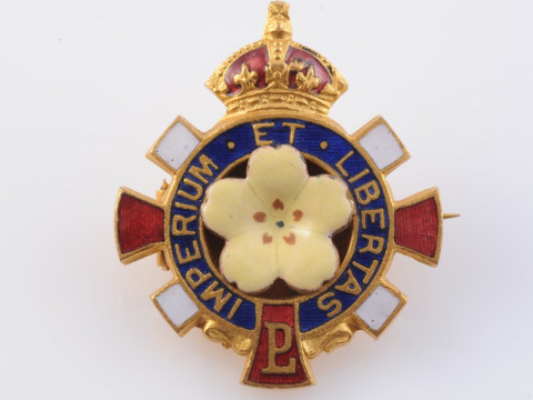 A PRIMROSE LEAGUE ENAMEL BROOCH, the yellow enamelled primrose flower...