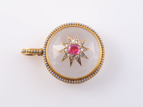 A ROCK CRYSTAL, DIAMOND AND RUBY LOCKET PENDANT, circa 1880-1890, the...