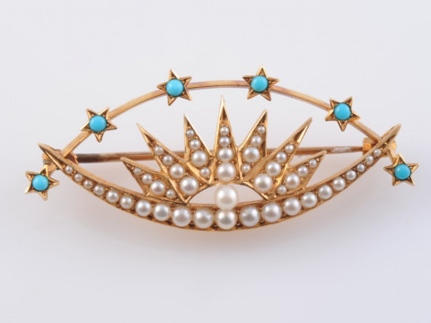 A SEED PEARL AND TURQUOISE BROOCH, circa 1900, the crescent shaped brooch...