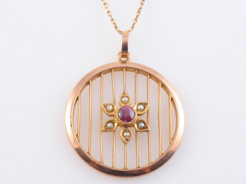 AN EDWARDIAN AMETHYST, SEED PEARL AND 9 CARAT GOLD PENDANT NECKLACE, the...