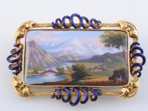 AN UNUSUALLY LARGE ENAMEL BROOCH, the square shaped mount set with an...