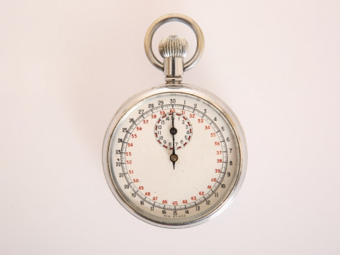 A BREITLING CHROME CASED MILITARY POCKET STOP WATCH, military markings,...