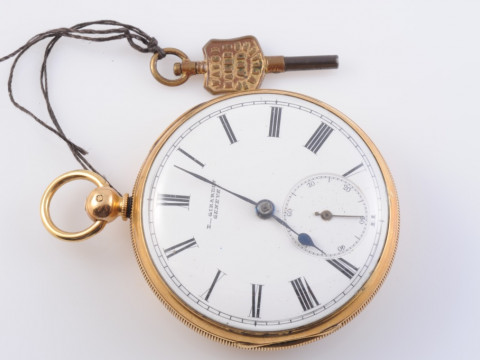 AN 18 CARAT GOLD OPEN FACE POCKET WATCH, the case hallmarked Sheffield...