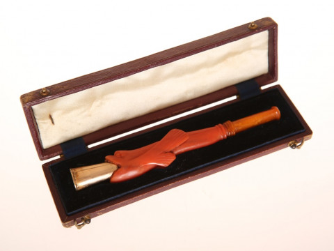 A LATE 19th CENTURY CARVED CORAL AND AMBER CHEROOT HOLDER, with ring-turned...