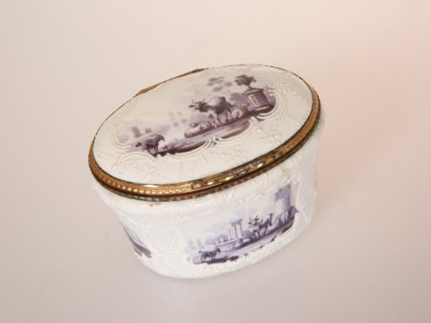 A FRENCH ENAMEL BOMBE SNUFF BOX, 18TH CENTURY, decorated with puce vignettes...