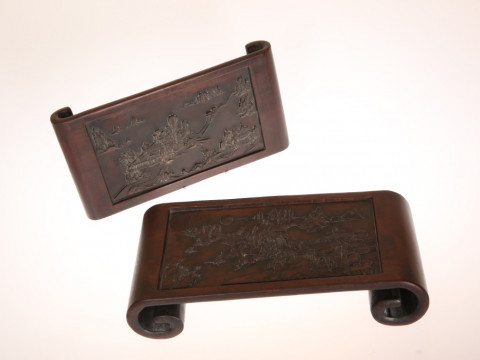 TWO CHINESE CARVED HARDWOOD SCRIBE'S STANDS, the larger with recessed...