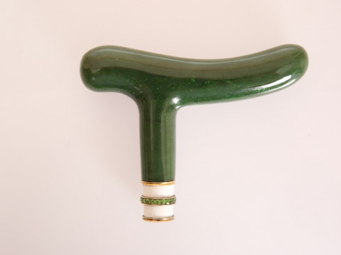 A NEPHRITE JADE, ENAMEL AND DEMANTOID GARNET SET CANE HANDLE, IN THE MANNER...