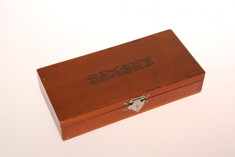 A JAPANESE ARMY FIELD DOCTOR'S SURGICAL KIT, World War II period, the instruments contained in a fitted wooden box with original pamphlet. Length of box 19.5cm Note: allegedly obtained on the island of Okinawa