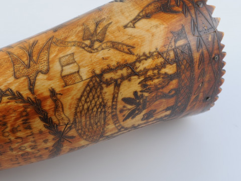 AN AUSTRALIAN POWDER HORN, with scrimshaw decoration of a ship in full sail, opposed by an inscription 'Presented to J. C. Low.....Jimbour, Queensland 1862' in a cartouche amidst birds and flags, inscribed with makers name Colvin or Corvin?. Length 33cm thumbnail