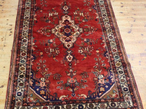 A MALAYER CARPET. 256cm by 150cm
