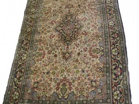 A FINE QUM CARPET. 225cm by 140cm