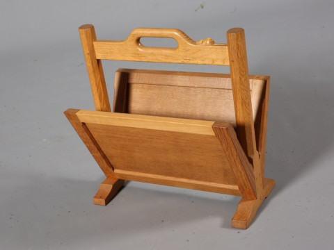 ROBERT THOMPSON OF KILBURN, A MOUSEMAN OAK MAGAZINE RACK, with carrying...