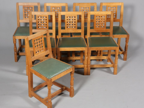 ROBERT THOMPSON OF KILBURN, A SET OF EIGHT MOUSEMAN OAK DINING CHAIRS,...