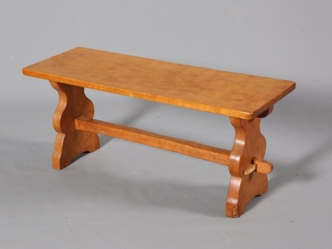THOMAS WHITTAKER, A GNOMEMAN OAK COFFEE TABLE, of refectory form, with...