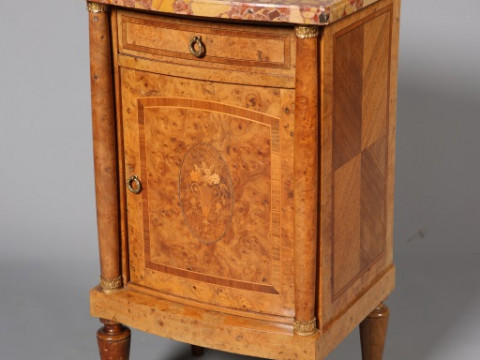 A BURR WALNUT AND MARBLE TOPPED POT CUPBOARD, the moulded top with serpentine...