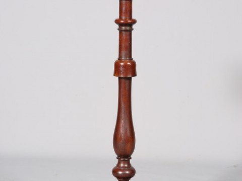A WILLIAM IV MAHOGANY CANDLESTAND, with moulded circular top above a turned...