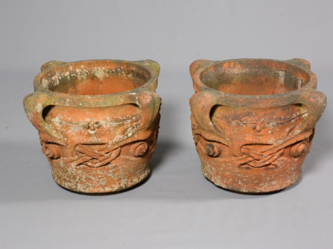 ARCHIBALD KNOX (1864-1933) FOR LIBERTY & CO A PAIR OF TERRACOTTA OLAF...