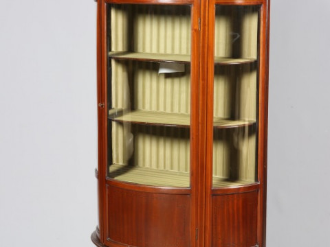 AN EDWARDIAN INLAID MAHOGANY DEMILUNE VITRINE, with three-quarter glazed...