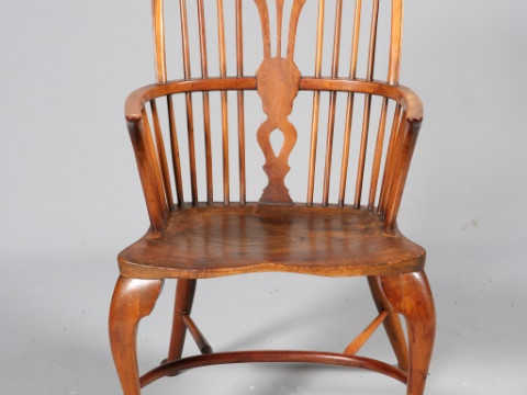 A YEW WOOD AND ELM WINDSOR CHAIR, with double pierced splat and crinoline...