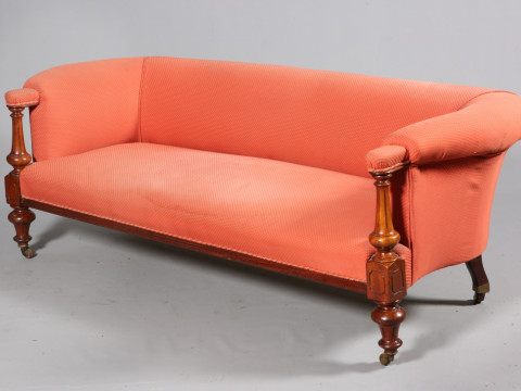 A VICTORIAN MAHOGANY AND UPHOLSTERED SETTEE, with fluted columns and turned...
