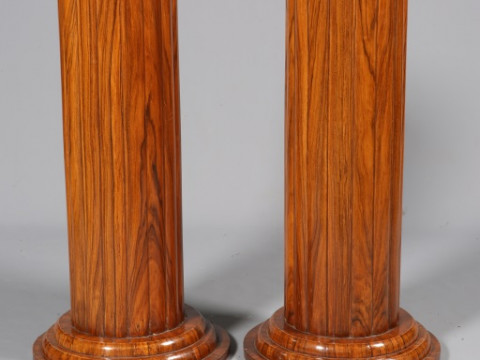 A PAIR OF ART DECO WALNUT PEDESTALS, of lobed circular outline, raised...