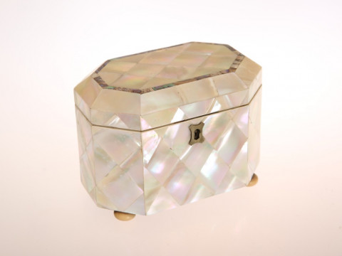 A MID VICTORIAN MOTHER-OF-PEARL TEA CADDY, of canted rectangular form,...