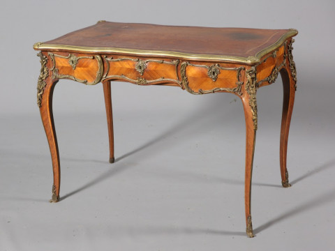 A LOUIS XV STYLE GILT-METAL MOUNTED, KINGWOOD AND LEATHER-INSET BUREAU...