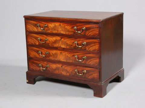 A GEORGE III MAHOGANY DRESSING CHEST, the moulded rectangular top above...