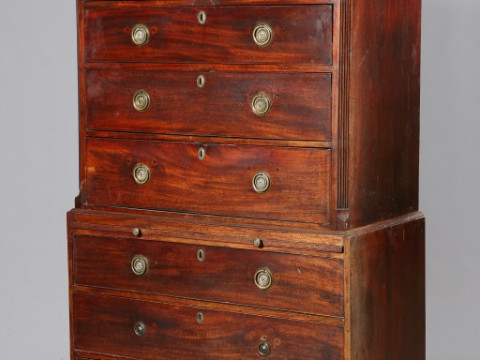 A GEORGE III MAHOGANY CHEST ON CHEST, the upper section with dentil cornice...