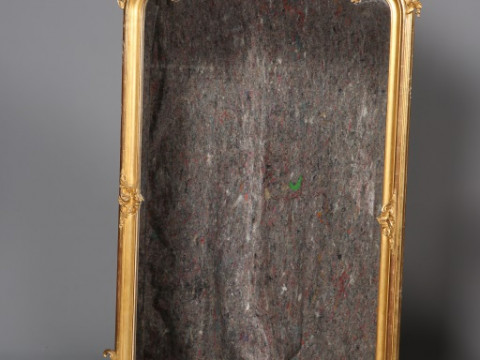 A FRENCH 19TH CENTURY GILT-COMPOSITION MIRROR, the dome-top with Rococo...