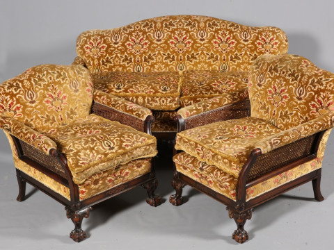 A CHIPPENDALE STYLE MAHOGANY BERGERE SUITE, late 19th/early 20th Century,...