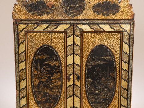 A CHINESE EXPORT LACQUER TABLE CABINET, 19th CENTURY, profusely decorated...