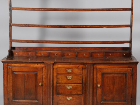 A GOOD GEORGE III OAK DRESSER AND RACK, the open rack with three shelves...