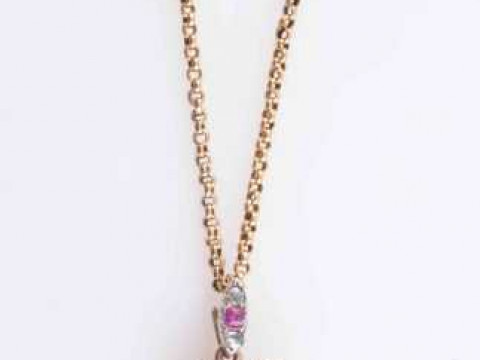 A DIAMOND, RUBY AND PEARL LOCKET PENDANT, circa 1870-1880, the heart shaped...