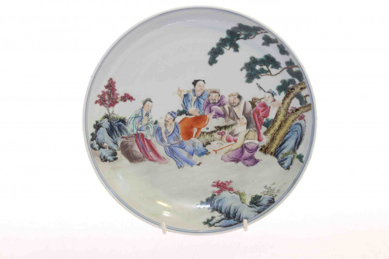 Chinese porcelain shallow dish with famille rose decoration of group of figures in outdoor setting, underglaze blue character mark, 23cm diameter
