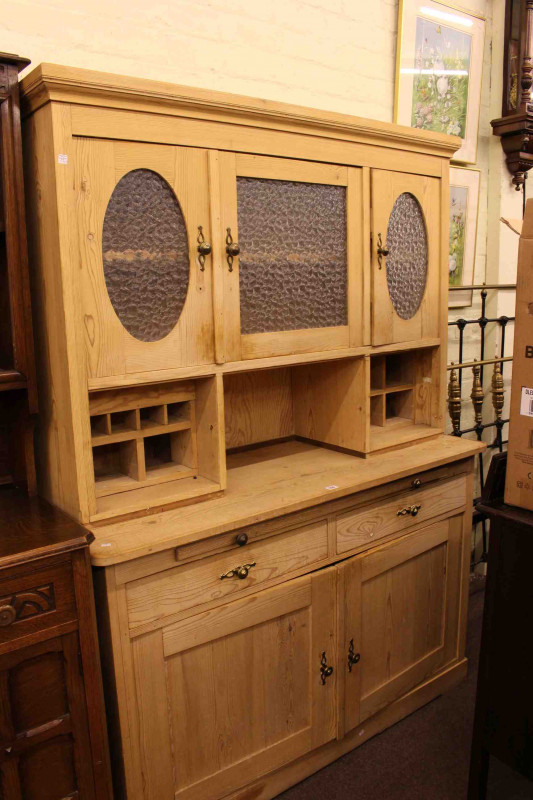 Stripped pine glazed door top dresser