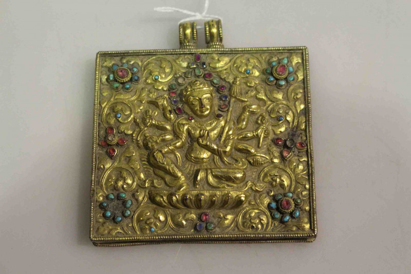 Jewelled brass relief of Indian Deity figure, 8.5cm by 9cm