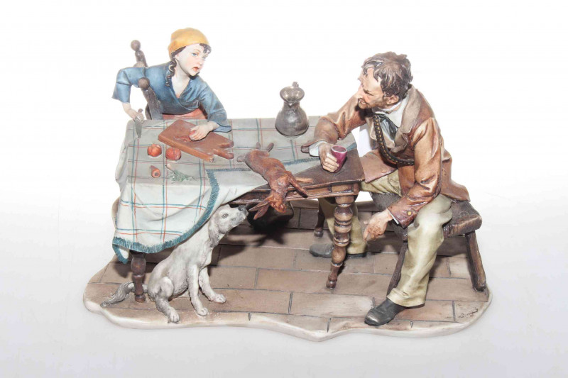 Capo di monte group of couple at kitchen table