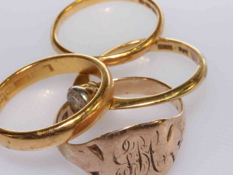 Two 22 carat gold bands, 18 carat gold ring and a 9 carat gold ring (4)...