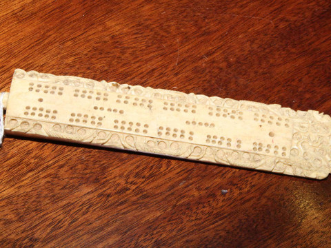 19th Century carved ivory cribbage board