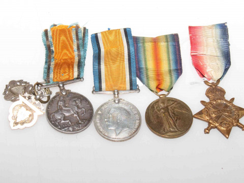 Four WWI medals and two silver fobs
