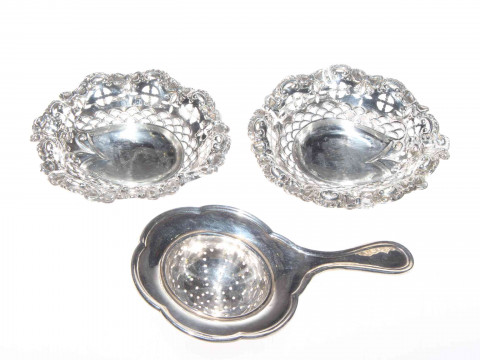 Pair of Victorian silver bon bon dishes and a silver tea strainer (3)